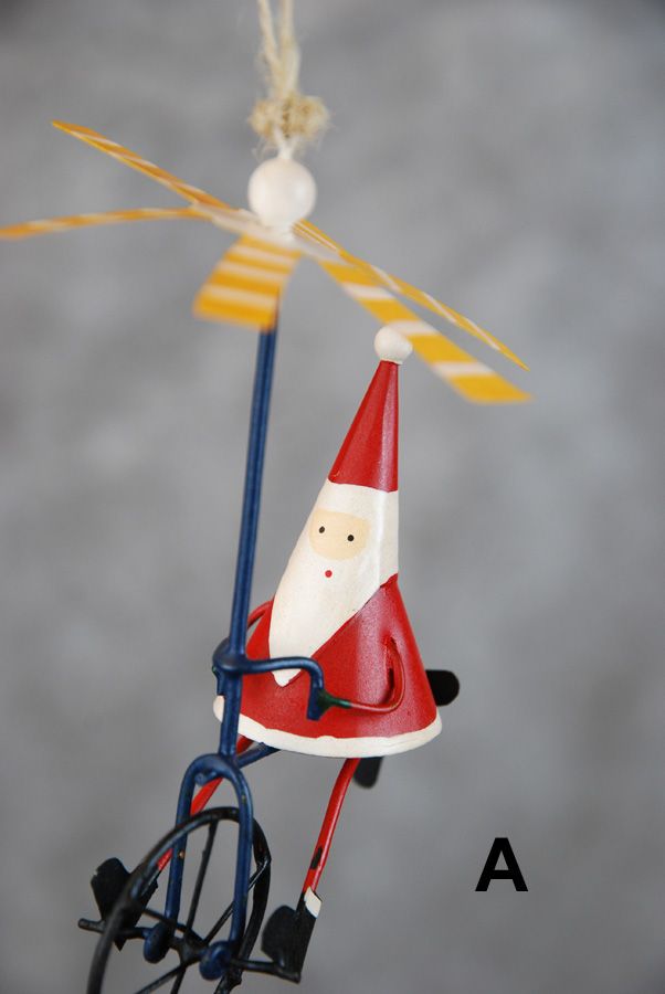 Weihnachtsmann / Schneemann auf dem Einrad