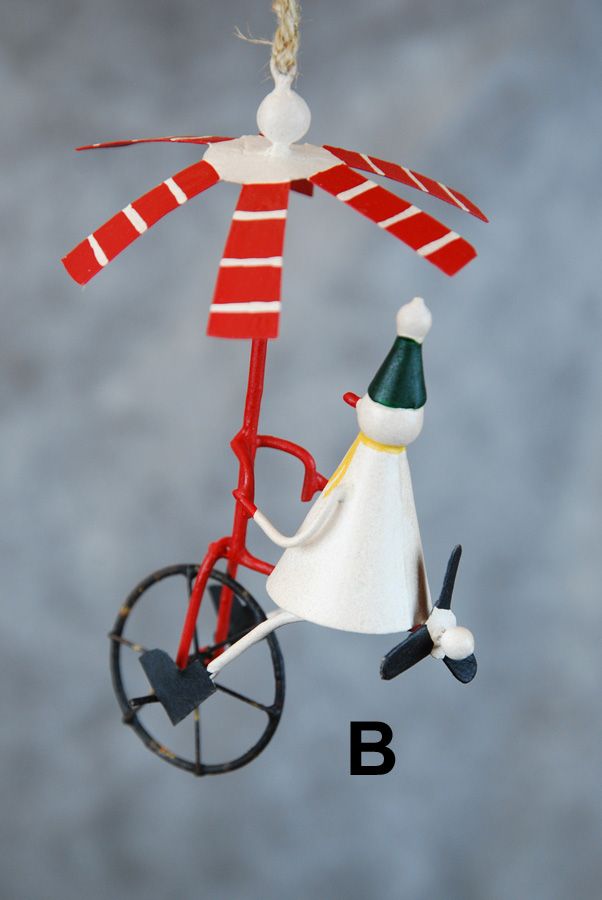 Weihnachtsmann / Schneemann auf dem Einrad