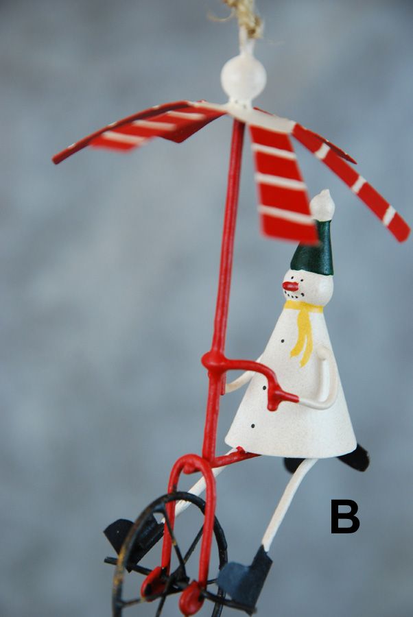 Weihnachtsmann / Schneemann auf dem Einrad